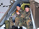 Müde aber frohen Mutes: Wettkämpfer der deutschen Bundeswehr. (Bild öffnet sich in einem neuen Fenster)