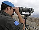 Beobachten und Melden: Die UN-Soldaten gehen weiter ihrer Arbeit nach. (Bild öffnet sich in einem neuen Fenster)