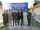 The multinational support team. (Image opens in new window)