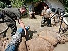 Austrian soldiers help after severe floodings. (Click to enlarge!)