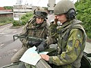 Ein Fähnrich beim Training mit einem schwedischen Kameraden. (Bild öffnet sich in einem neuen Fenster)