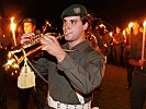 Ein Trompeter spielt den "Großen Zapfenstreich" zum Ende der Angelobung. (Bild öffnet sich in einem neuen Fenster)