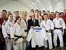 Verteidigungsminister Klug mit dem Judo-Team.