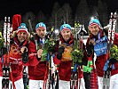 Olympia-Bronze: Die Biathleten Christoph Sumann, Daniel Mesotitsch und die Heeressportler Simon Eder und Dominik Landertinger mit ihren Medaillen.