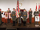 Der Insignientrupp des Bataillons und Musiker der Gardemusik.