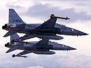 F-5 Abfangjäger sichern während des Besuchs den Luftraum.