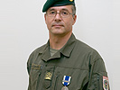 Oberst Obmann mit der "Meritorious Service Medal": Den Einwohnern des Kosovo signalisieren, dass es langsam, aber sicher aufwärts geht.