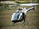 ...überwachen OH-58 "Kiowa" Hubschrauber das Geschehen aus der Luft. (Bild öffnet sich in einem neuen Fenster)