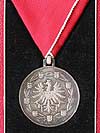 Silberne Medaille für Verdienste um die Republik Österreich am roten Bande. (Bild öffnet sich in einem neuen Fenster)