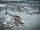14.6.: Zwei OH-58 Helikopter im Hafen über Antwerpen. (Bild öffnet sich in einem neuen Fenster)