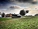 21.11.: Eine Panzerhaubitze feuert eine Granate ab. (Bild öffnet sich in einem neuen Fenster)