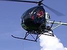 Schweizer 300 versucht den Eimer so genau wie möglich zu platzieren. (Bild öffnet sich in einem neuen Fenster)
