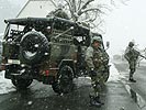 Italienische Alpini sichern das Vorgehen der Österreicher. (Bild öffnet sich in einem neuen Fenster)