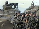 ... und slowenische Kameraden der 1.Infanteriebrigade begleiten den Konvoi. (Bild öffnet sich in einem neuen Fenster)