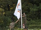 Schlussakt: Die CISM-Flagge wird eingeholt... (Bild öffnet sich in einem neuen Fenster)