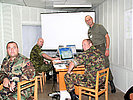 Für die Feindlage zuständig; Oberstleutnant Kunert und sein Team. (Bild öffnet sich in einem neuen Fenster)