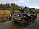 Schützenpanzer rücken zur Verstärkung an. (Bild öffnet sich in einem neuen Fenster)