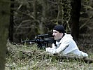 Ein Soldat in der Rolle eines schwer bewaffnete "Freedom Fighters". (Bild öffnet sich in einem neuen Fenster)