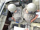 Rücken an Rücken ein Team: Der Beobachtungstrupp. (Bild öffnet sich in einem neuen Fenster)