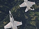 Die eidgenössischen Piloten sind das Fliegen über Bergen gewohnt. (Bild öffnet sich in einem neuen Fenster)