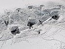 Feuerstellung eines schweren  Granatwerferzuges im verschneiten, alpinen Einsatzraum