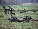 Tschechische Panzergrenadiere im Angriff. (Bild öffnet sich in einem neuen Fenster)