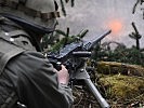 Ein überschweres Maschinengewehr im Feuerkampf. (Bild öffnet sich in einem neuen Fenster)