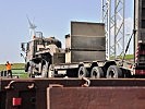 Die Hakenladesysteme werden für den Containertransport benötigt. (Bild öffnet sich in einem neuen Fenster)