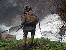 Ein belgischer Soldat beim Überwinden eines Gebirgsbaches. (Bild öffnet sich in einem neuen Fenster)