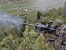 Ein deutscher leichter 40-Millimeter Granatwerfer beim Feuerkampf. (Bild öffnet sich in einem neuen Fenster)