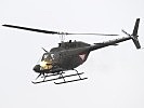 OH-58 bewaffnet mit einem sechsläufigen 7,62mm Maschinengewehr. (Bild öffnet sich in einem neuen Fenster)