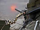Schussabgabe durch das 12,7 mm überschwere Maschinengewehr. (Bild öffnet sich in einem neuen Fenster)
