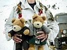 Die Glücksmaskottchen des führenden Teams. (Bild öffnet sich in einem neuen Fenster)