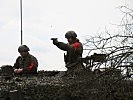 Schießen mit der Pistole 80. (Bild öffnet sich in einem neuen Fenster)
