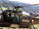 Piloten, Notarzt und Flugretter: das Notfallteam auf der "Alouette" III. (Bild öffnet sich in einem neuen Fenster)