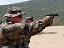 Der Pistolenschütze konzentriert sich auf das Ziel. (Bild öffnet sich in einem neuen Fenster)