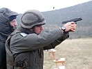 Der Pistolenschütze konzentriert sich auf das Ziel. (Bild öffnet sich in einem neuen Fenster)