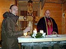 Entzünden der ersten Adventkerze beim Adventeinläuten in der Campkirche. (Bild öffnet sich in einem neuen Fenster)