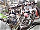 Besichtigung im niedergebrannten Erzengelkloster bei Prizren. (Bild öffnet sich in einem neuen Fenster)