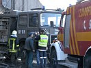 Der Einsatzleiter koordiniert alle Kräfte- zivile und militärische. (Bild öffnet sich in einem neuen Fenster)