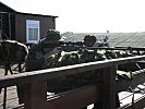 Ein österreichischer Scharfschützentrupp beim Schutz der NATO-Konferenz. (Bild öffnet sich in einem neuen Fenster)