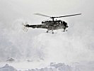 A search and rescue helicopter from the Austrian Helicopter Detachment. (Image opens in new window)