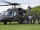 Soldiers are called in to evacuate civilians. (Image opens in new window)