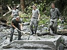 Hundreds of soldiers are helping to restore order in the area. (Image opens in new window)