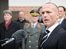 The new minister during his inaugural speech. (Image opens in new window)
