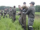 Army personnel helps to fight the floods. (Image opens in new window)