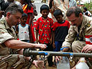 Austrian soldiers provided the population with drinking water ... (Image opens in new window)