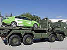 Das gepanzerte Hackenladesystem und ein Elektroauto der Energie Steiermark. (Bild öffnet sich in einem neuen Fenster)