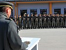 Die Fliegertruppe trägt als äußeres Zeichen die Fliegermütze. (Bild öffnet sich in einem neuen Fenster)