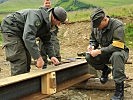 Ein Metallträger wird für die Sprengung berechnet. (Bild öffnet sich in einem neuen Fenster)